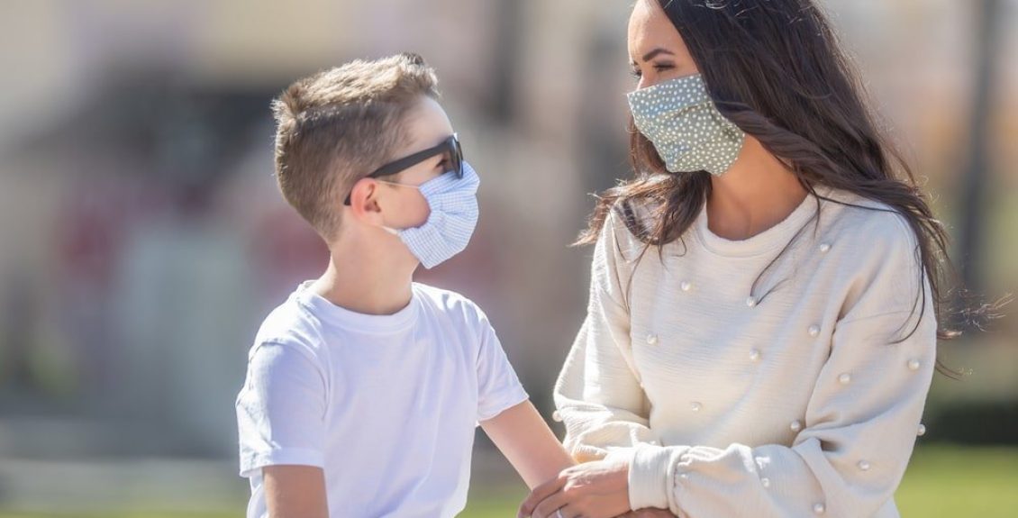 Mother And Son Wearing Masks